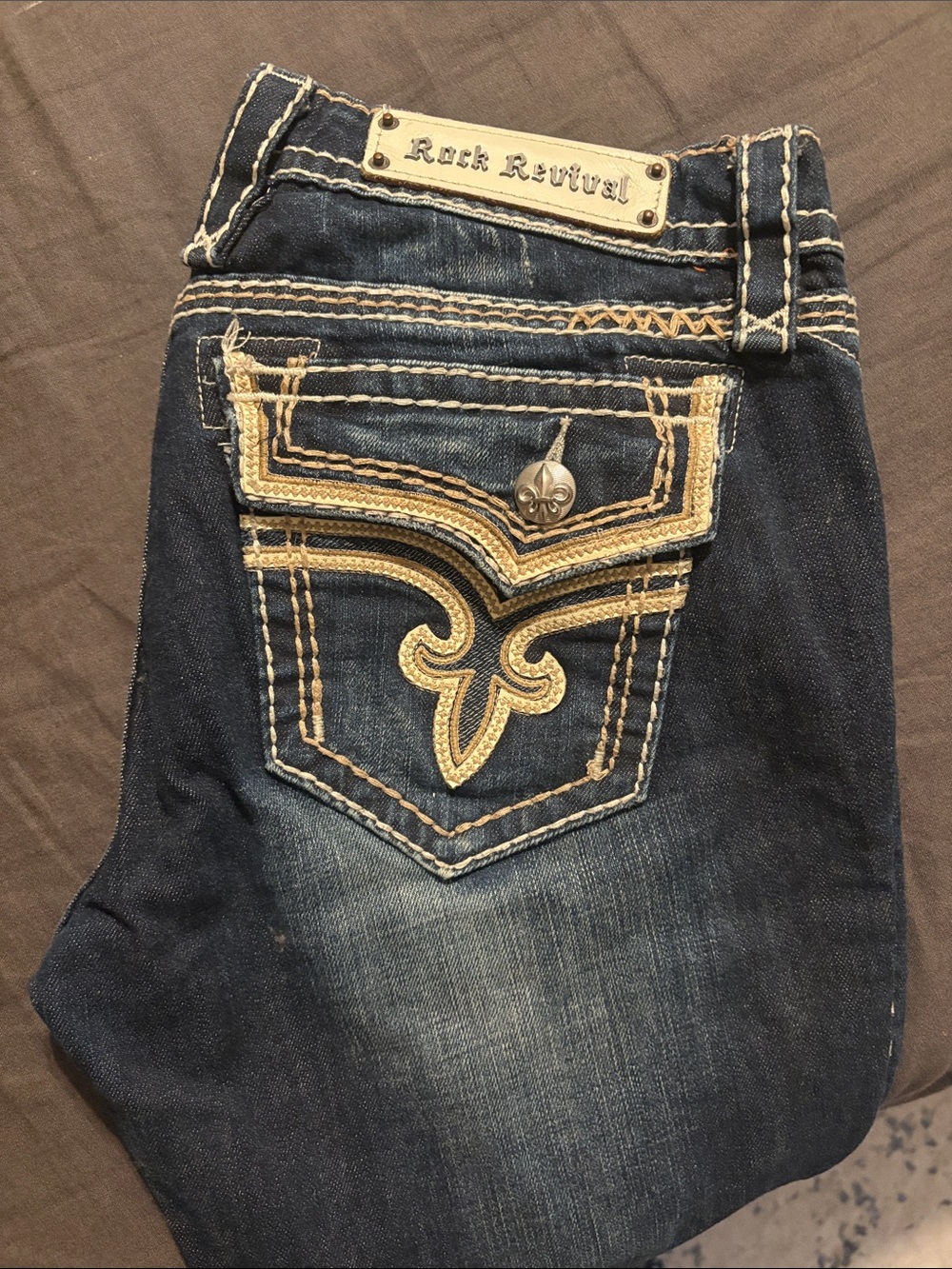Rock Revival Dark Blue Jeans with Tan Embroidered Pocket